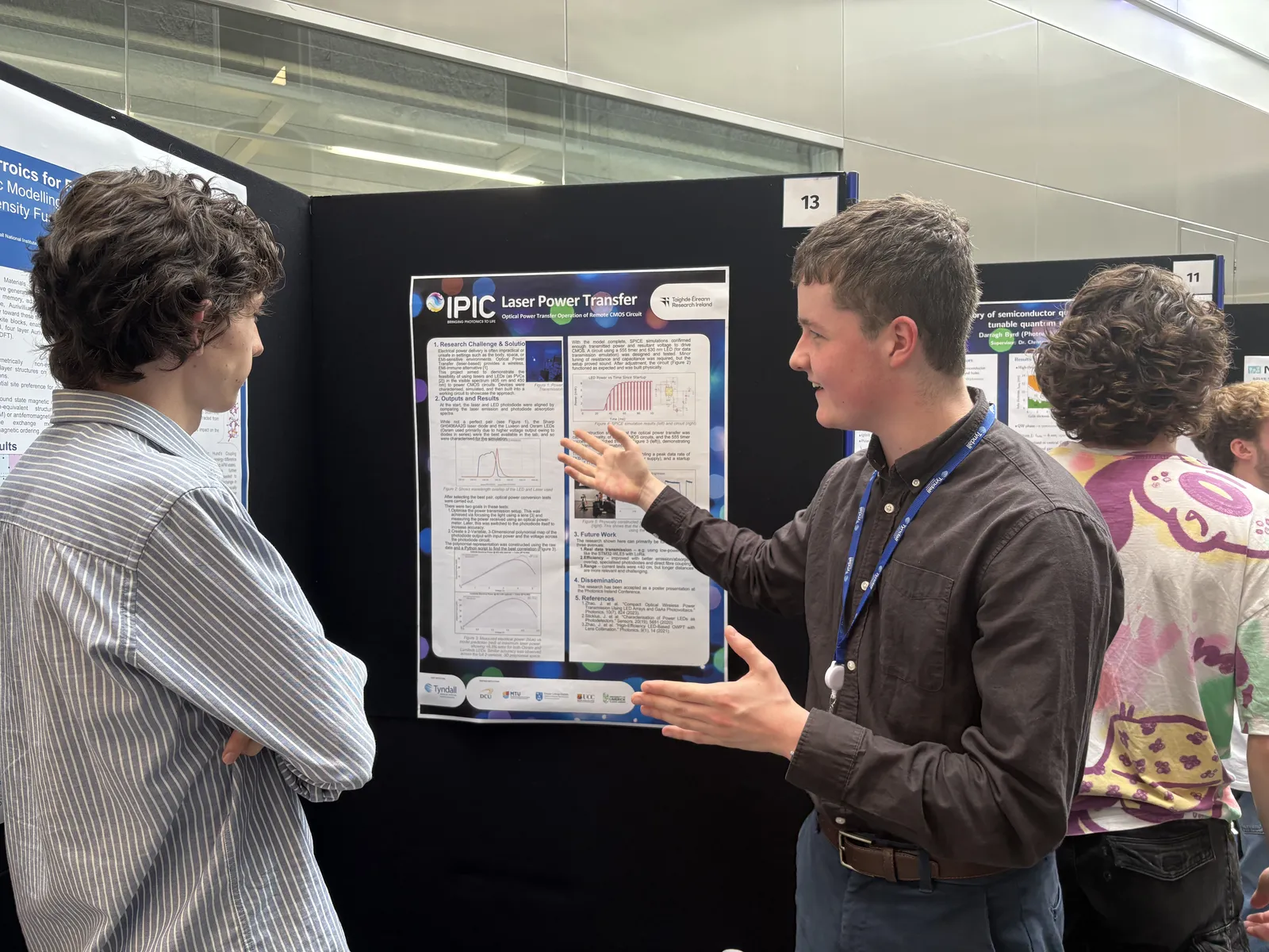 Eoghan Collins presenting the laser power transfer poster at the Photonics Ireland conference